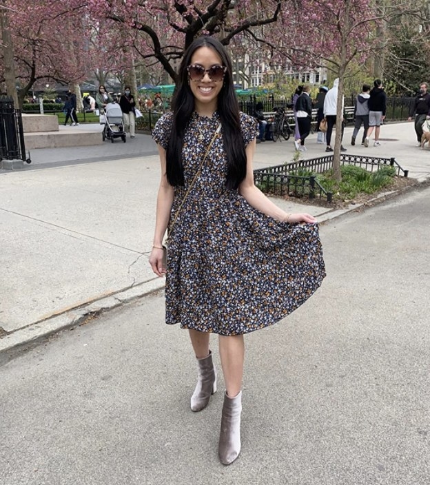 A person wearing a floral dress