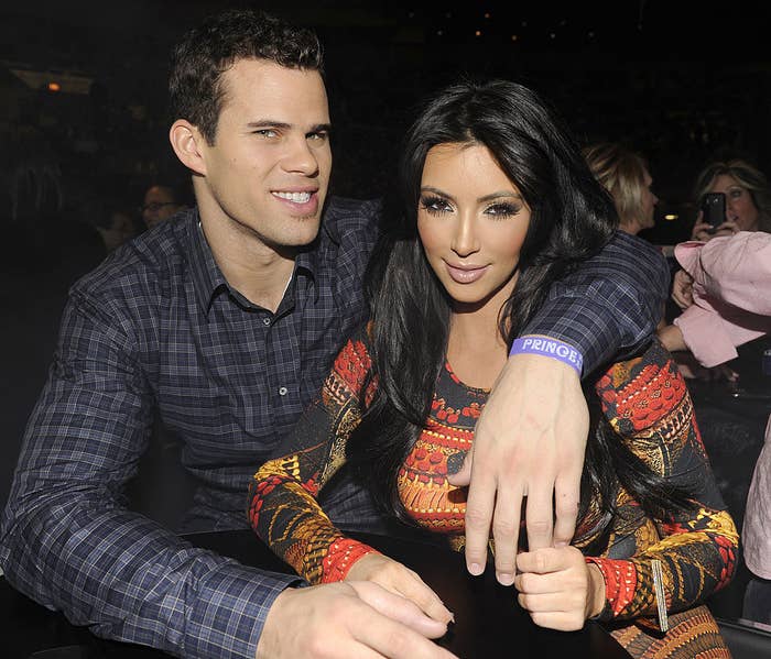 Kris Humphries (L) and Kim Kardashian watch Prince perform during his &quot;Welcome 2 America&quot; tour