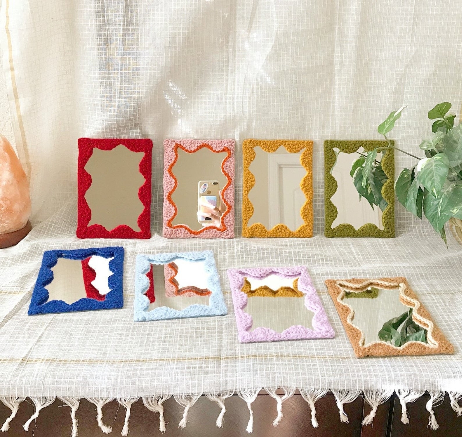 The rectangular small mirrors in red, pink, green, yellow, lavender, and more