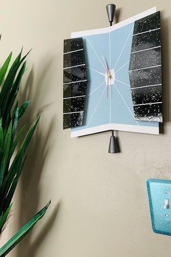 the wall plate covering a light switch in blue
