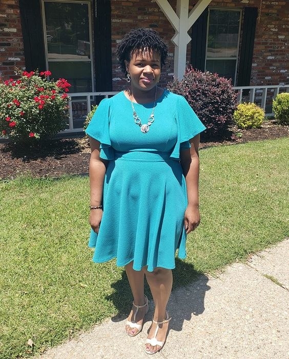 Reviewer wearing the dress in teal