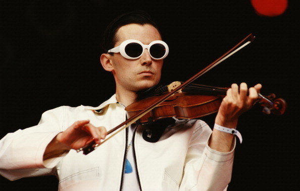 English rock musician playing the violin