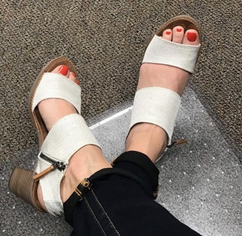 Reviewer photo of the white and brown cut-out sandals
