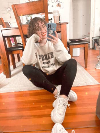buzzfeed writer wearing the chunky white sneakers 