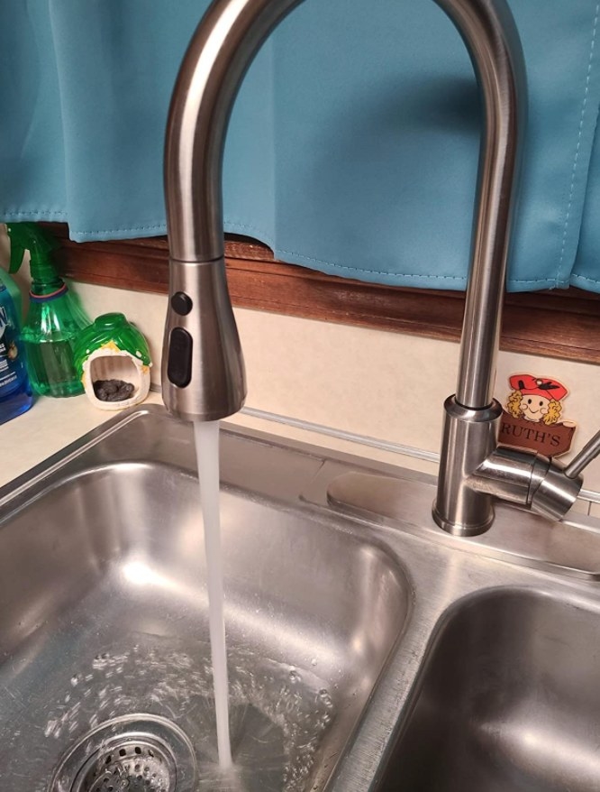 A reviewer&#x27;s sink with the faucet installed 