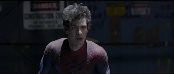 Spiderman unmasked in his costume