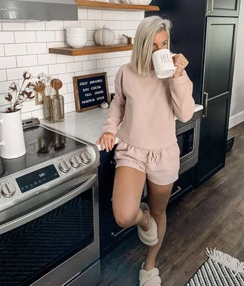 A taupe loungewear set on a reviewer 