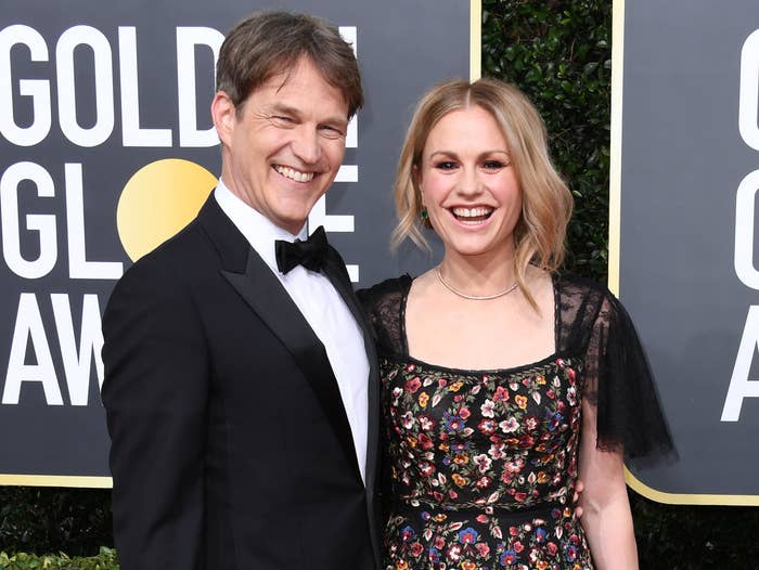 Anna and Stephen smile while at an award show