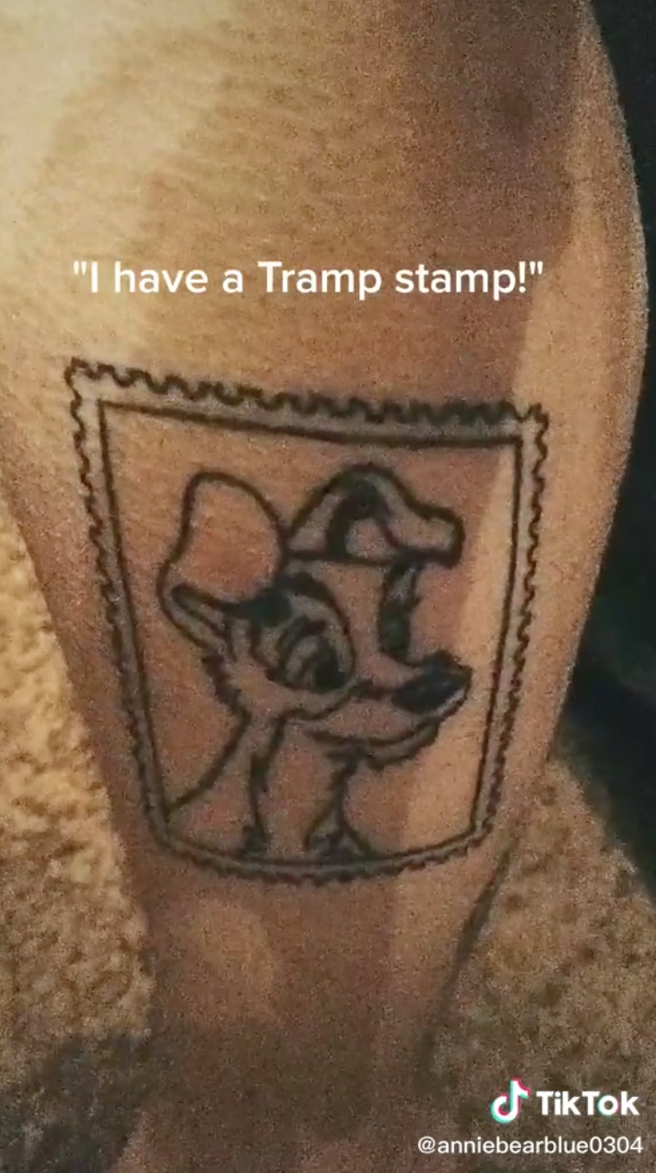 A stamp with a pic of Tramp from the film &quot;Lady and the Tramp&quot; inside of it