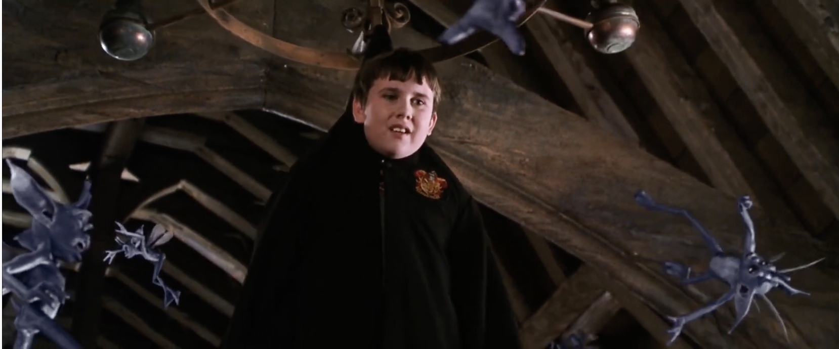 Neville hanging from the chandelier in the second Potter movie