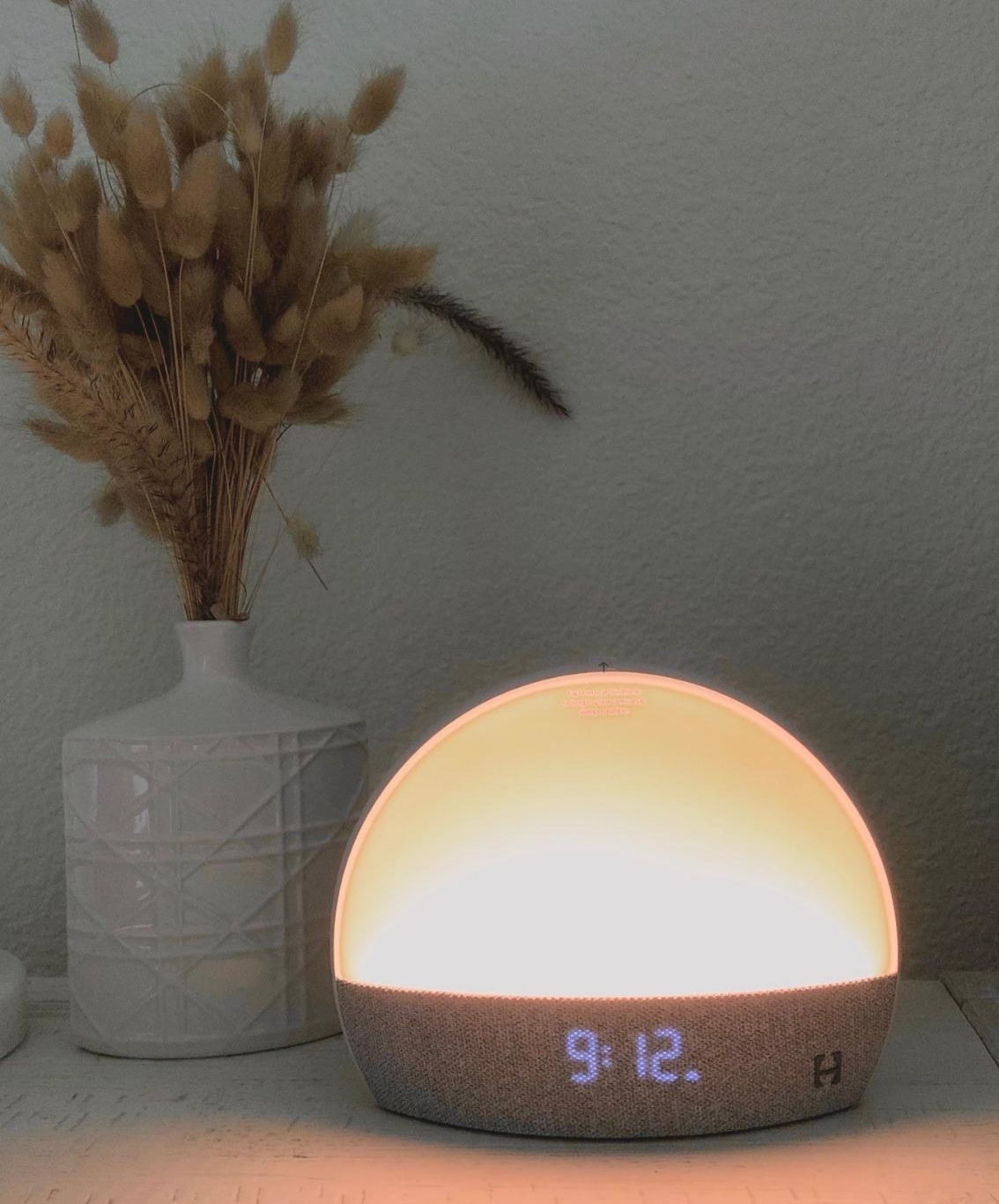 the alarm clock/night light on a reviewer&#x27;s nightstand