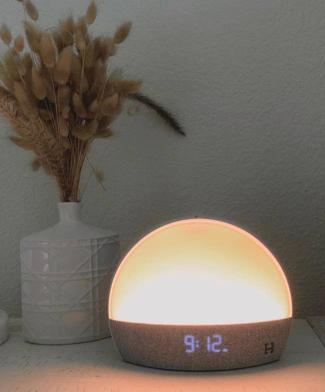 the alarm clock/night light on a reviewer's nightstand