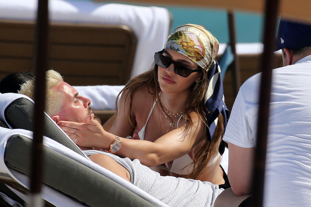 Amelia and Scott lounging at the beach