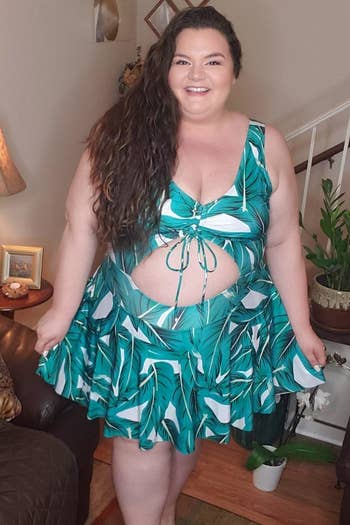 image of reviewer wearing the green esprilia floral tankini in a size 5XL