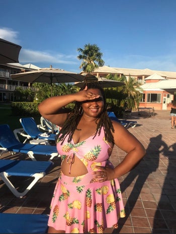 image of reviewer wearing the pink esprilia floral tankini in a size 2XL