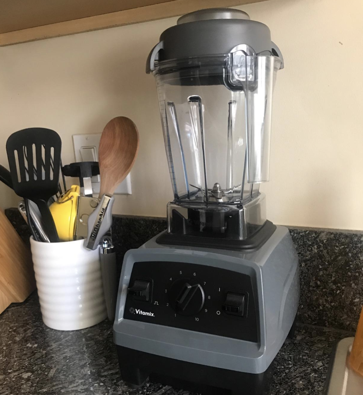 The Vitamix fitting under a kitchen cabinet
