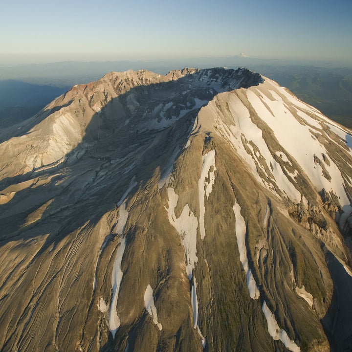 Mount St. Helens today looking like a popped zit, with the whole top and side blown out