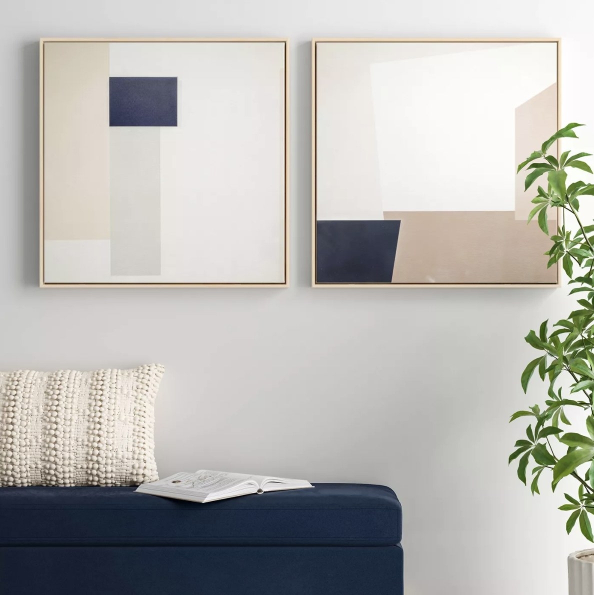 The two painting are square-shaped with tones of light blue, cream, beige and navy