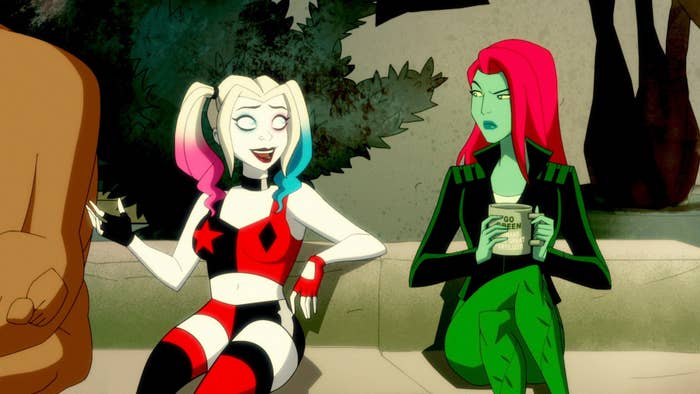 Harley and Ivy talking on a bench