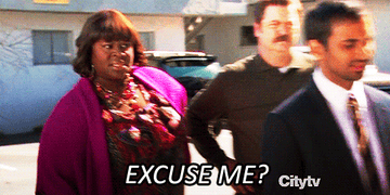 Camera panning in on a woman saying, &quot;Excuse me?&quot;