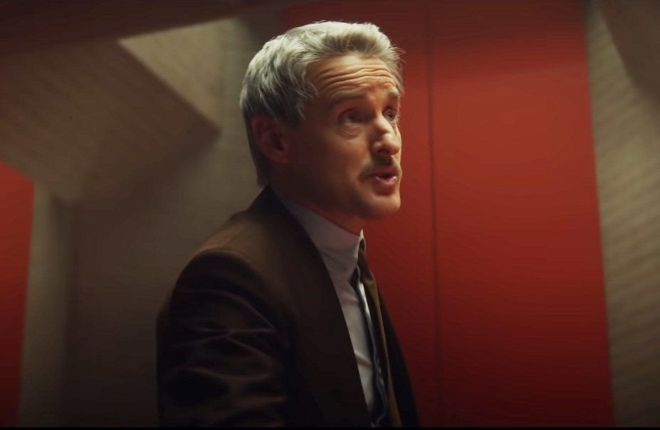 Owen in a scene as Mobius, a TVA agent