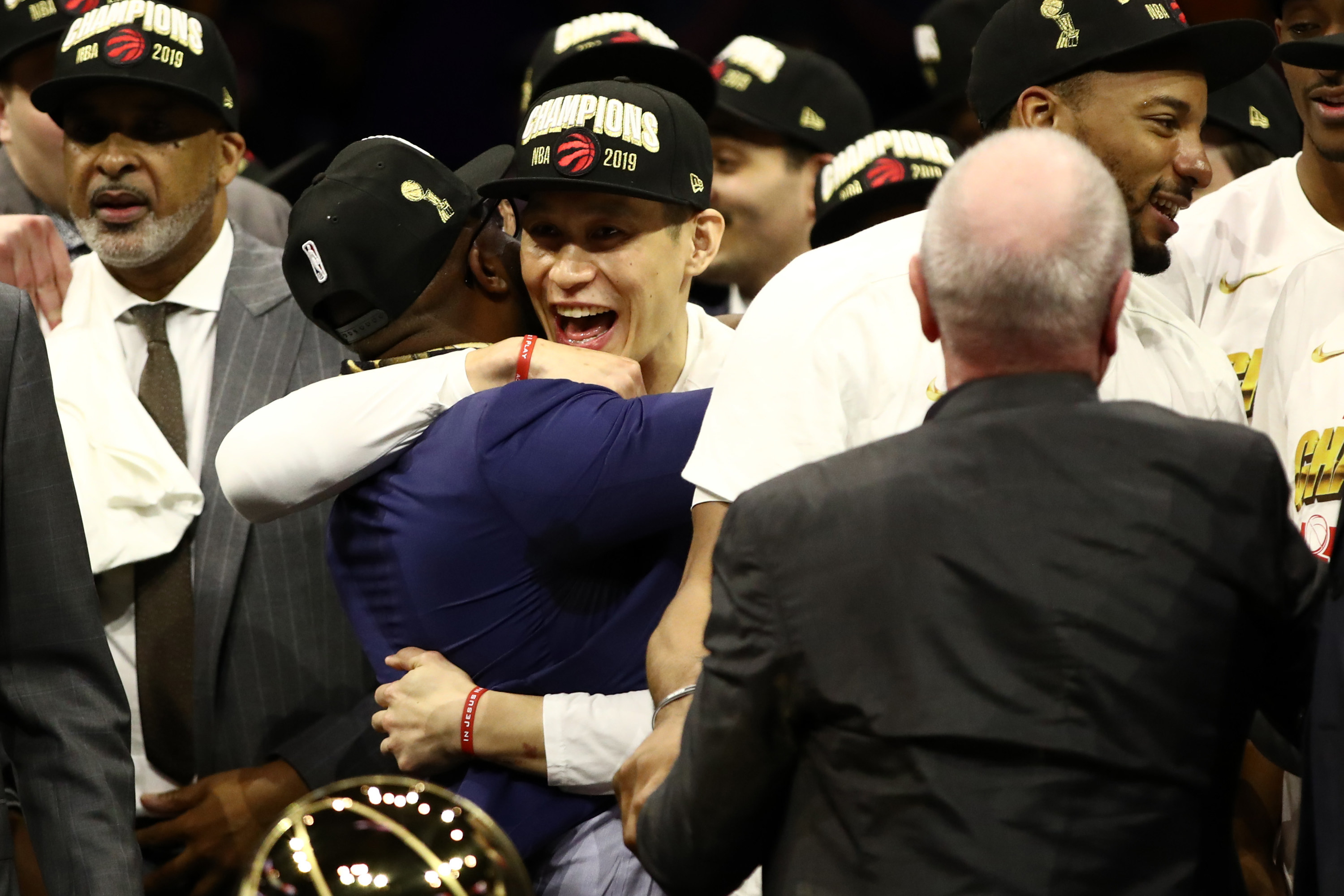 Jeremy Lin hugs teammate after Raptors championship win