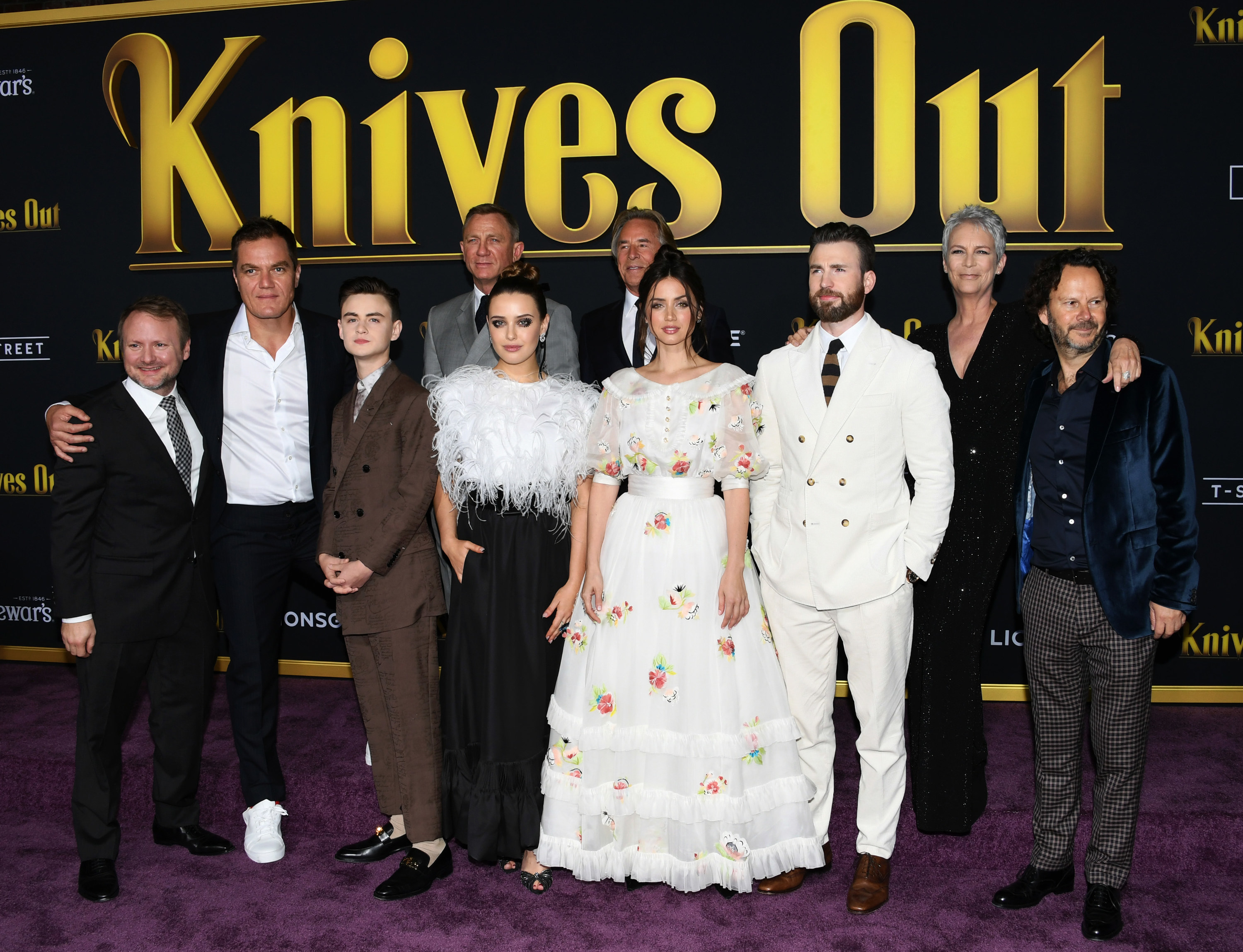 Writer and director Rian Johnson, Michael Shannon, Jaeden Martell, Daniel Craig, Katherine Langford, Don Johnson, Ana de Armas, Chris Evans, Jamie Lee Curtis, and Ram Bergman attend the 2019 premiere of &quot;Knives Out&quot; in Westwood, California