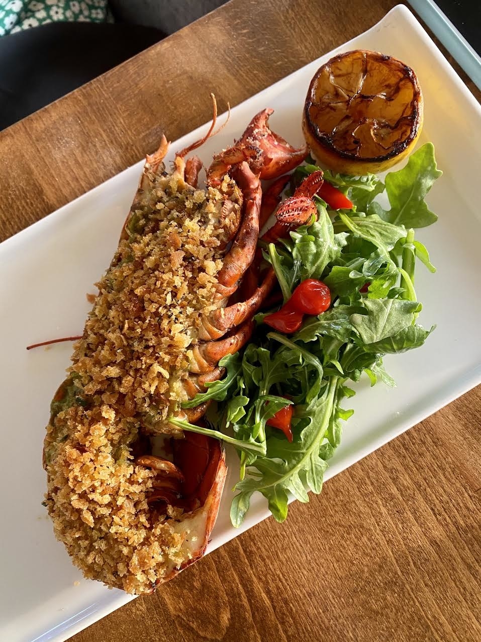 A meal with lobster and salad