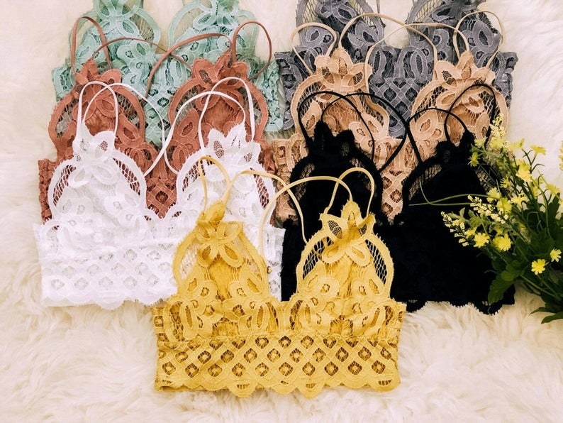 The bralettes in yellow, white, black, peach, grey, seafoam, and more