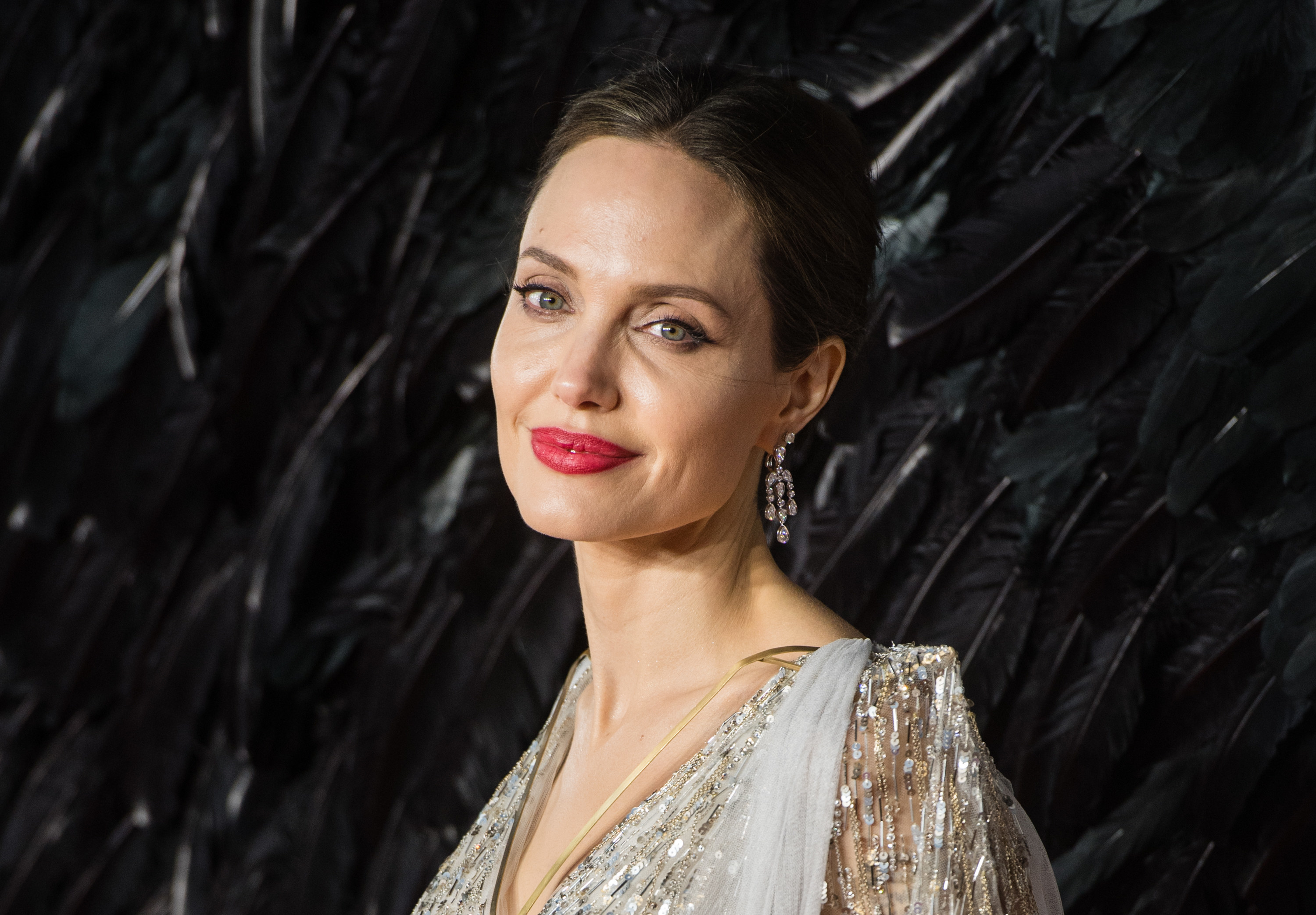 Angelina smiles on a red carpet 