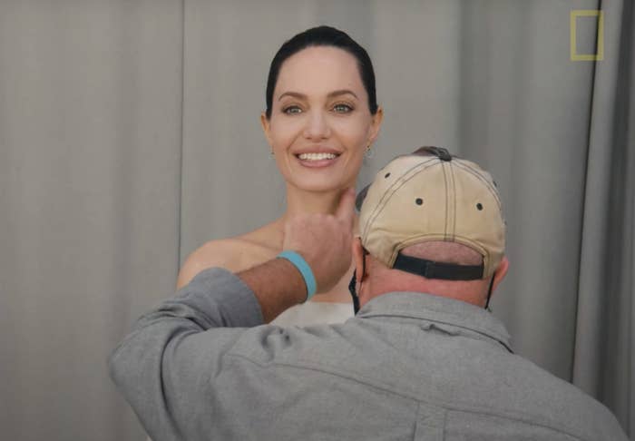 A man rubs the pheromone on Angelina