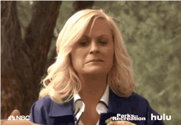 Leslie Knope spits some thing out of her mouth in disgust