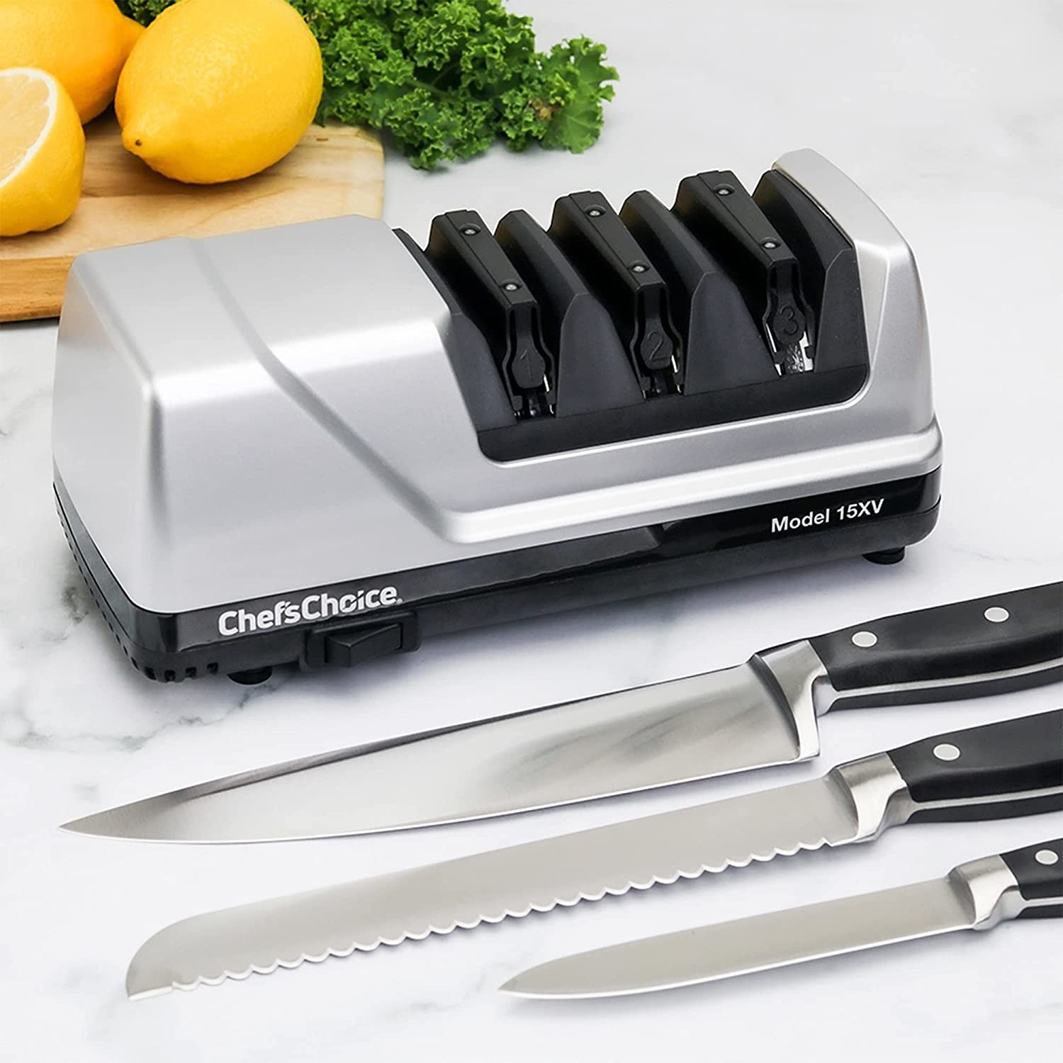 The three-stage model with some knives on a counter