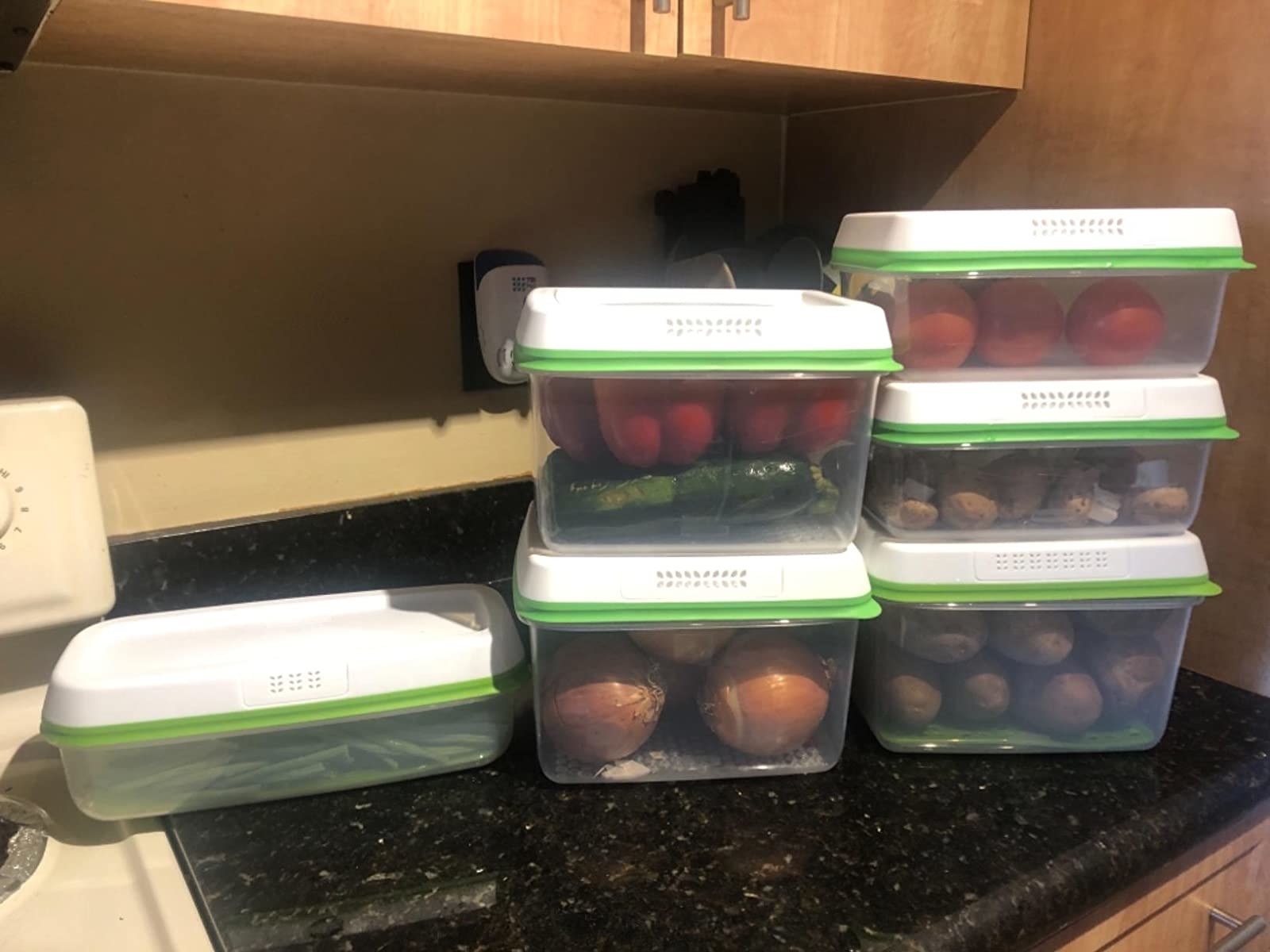 Containers of several sizes filled with veggies