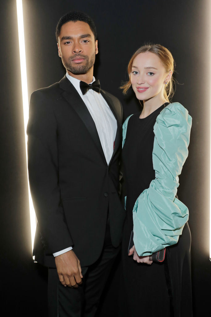 regé-jean page and phoebe dynevor posing together