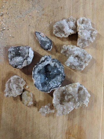 a reviewer's rocks cracked in half to reveal the crystals inside