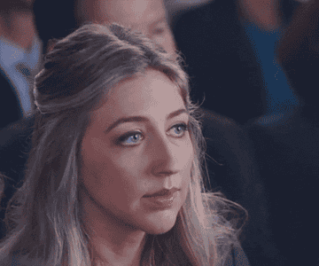 GIF of woman looking disgusted