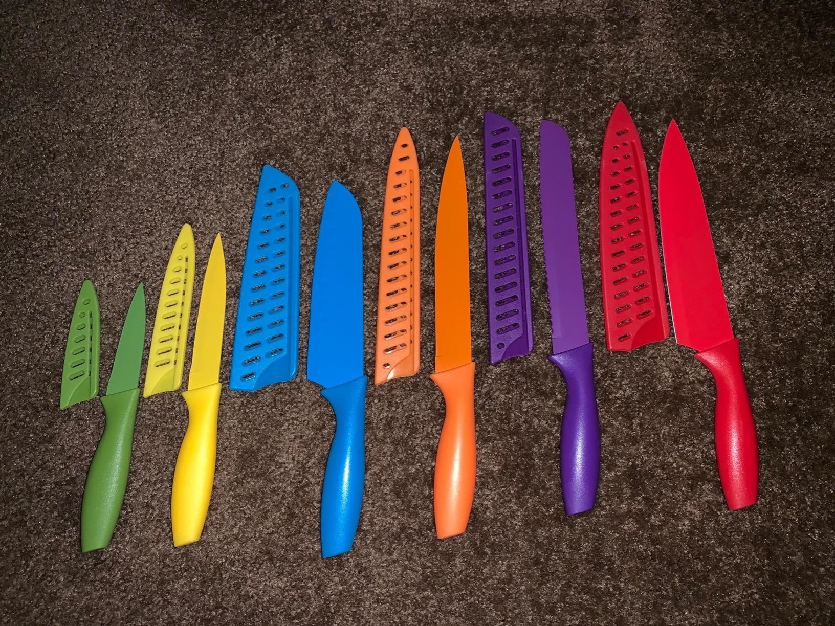 A reviewer photo of the knives, laid out with their covers