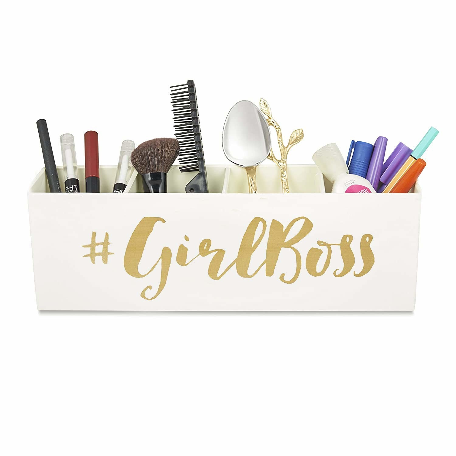 A white desk organiser with items in it and the text #GirlBoss written on it.