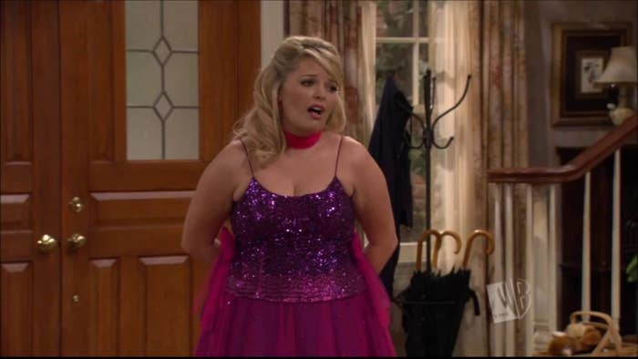 Barbra Jean in a sparkly twirler outfit looking disappointed