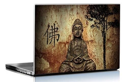 A laptop with a zen Budhha skin on it