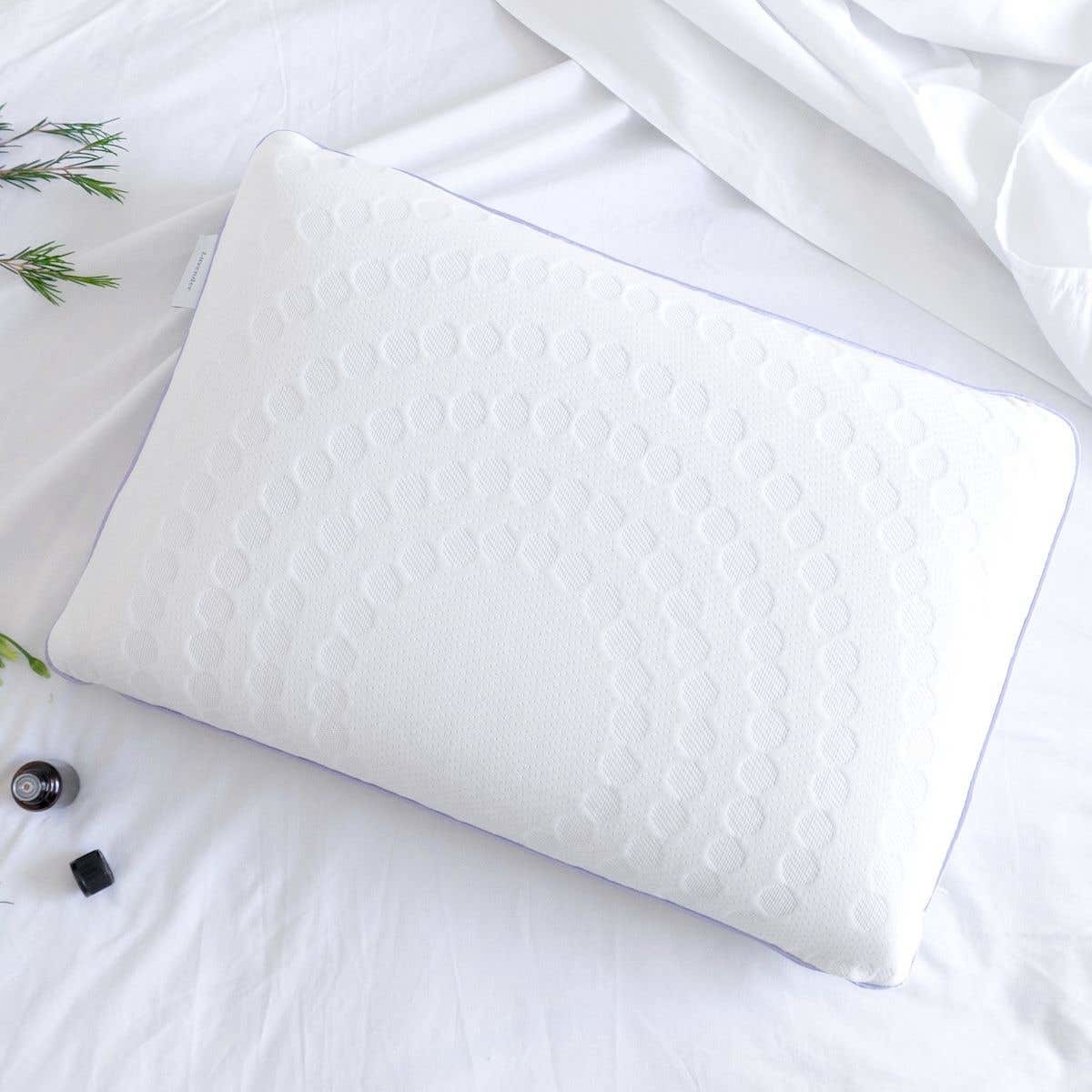 A large pillow on a bed