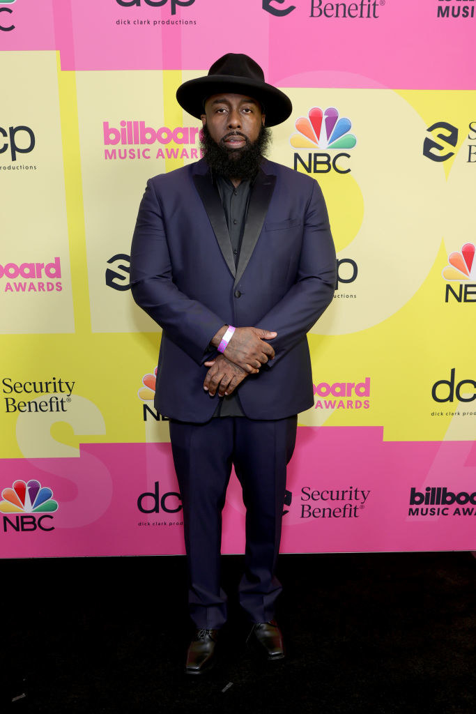 Trae tha Truth poses backstage for the 2021 Billboard Music Awards