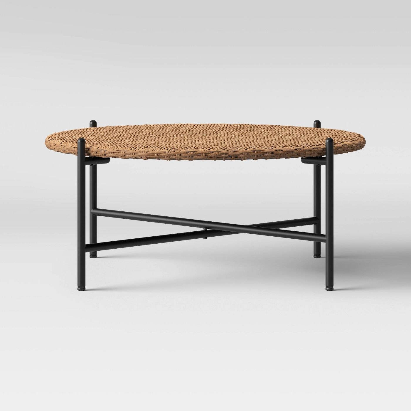 Brown woven table with black legs 