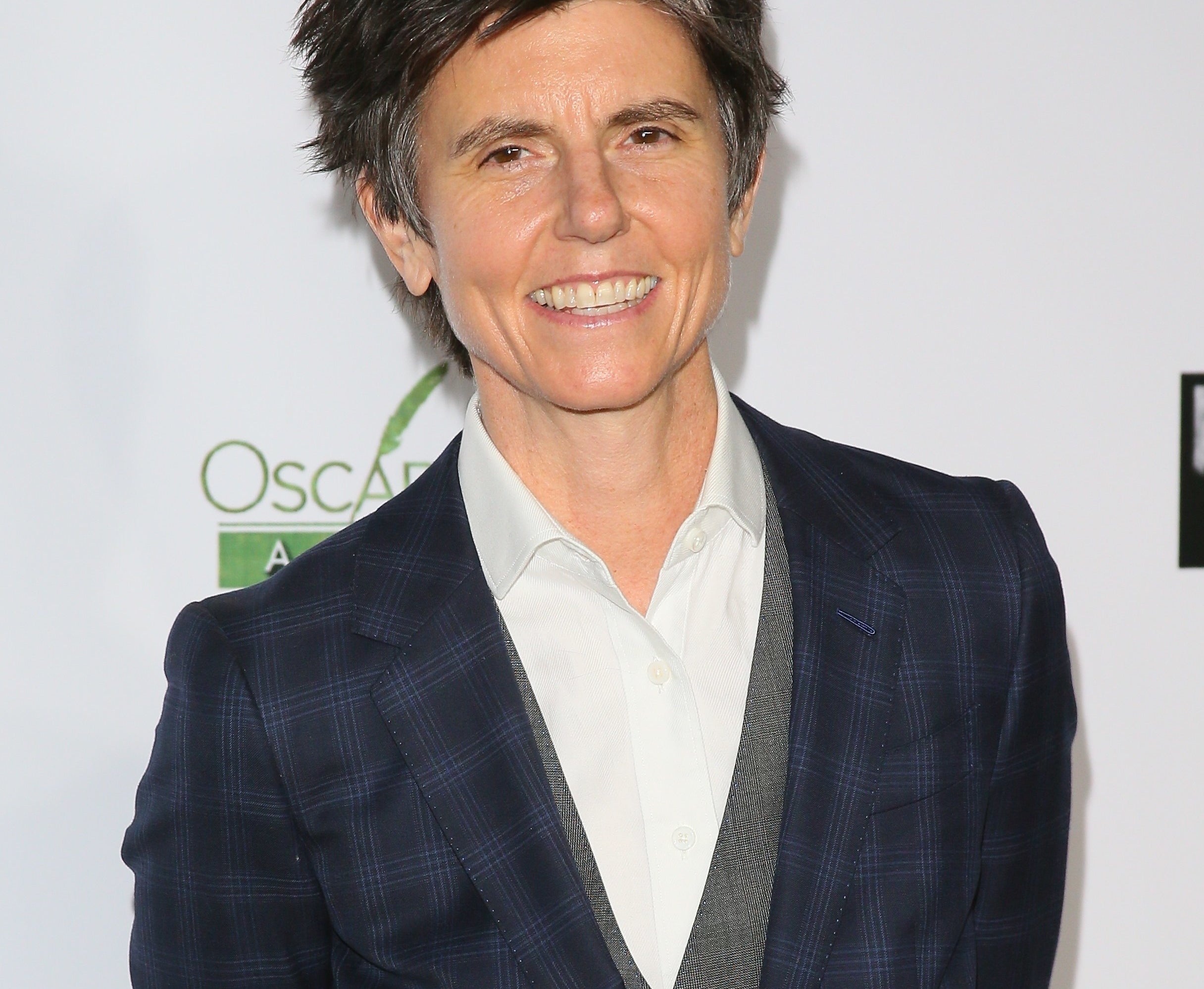 Tig Notaro smiling on a red carpet