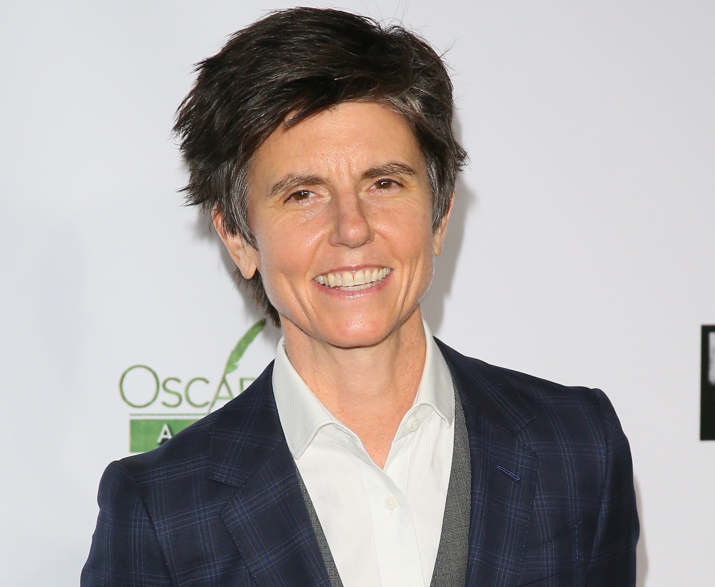 Tig Notaro smiling on a red carpet