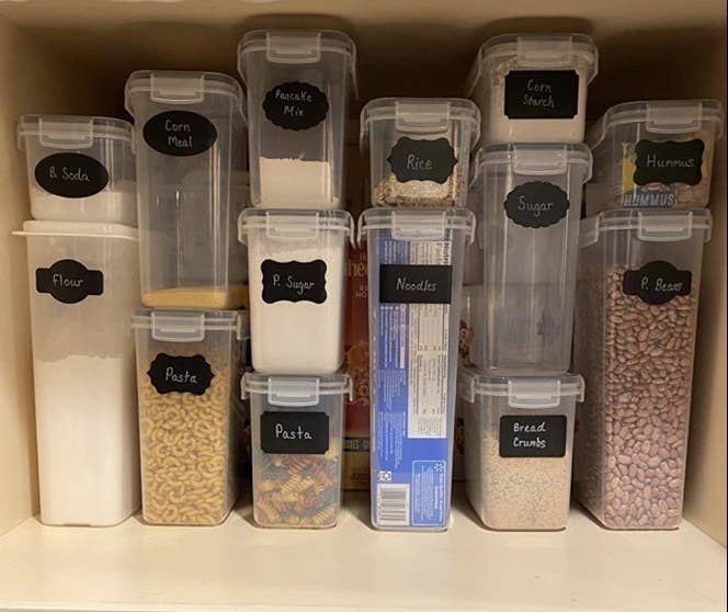 A reviewer&#x27;s fourteen piece container storage set in a cupboard 