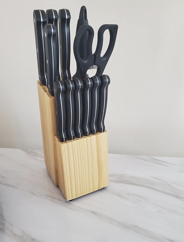 A reviewer&#x27;s knife set in a wooden block on a kitchen counter