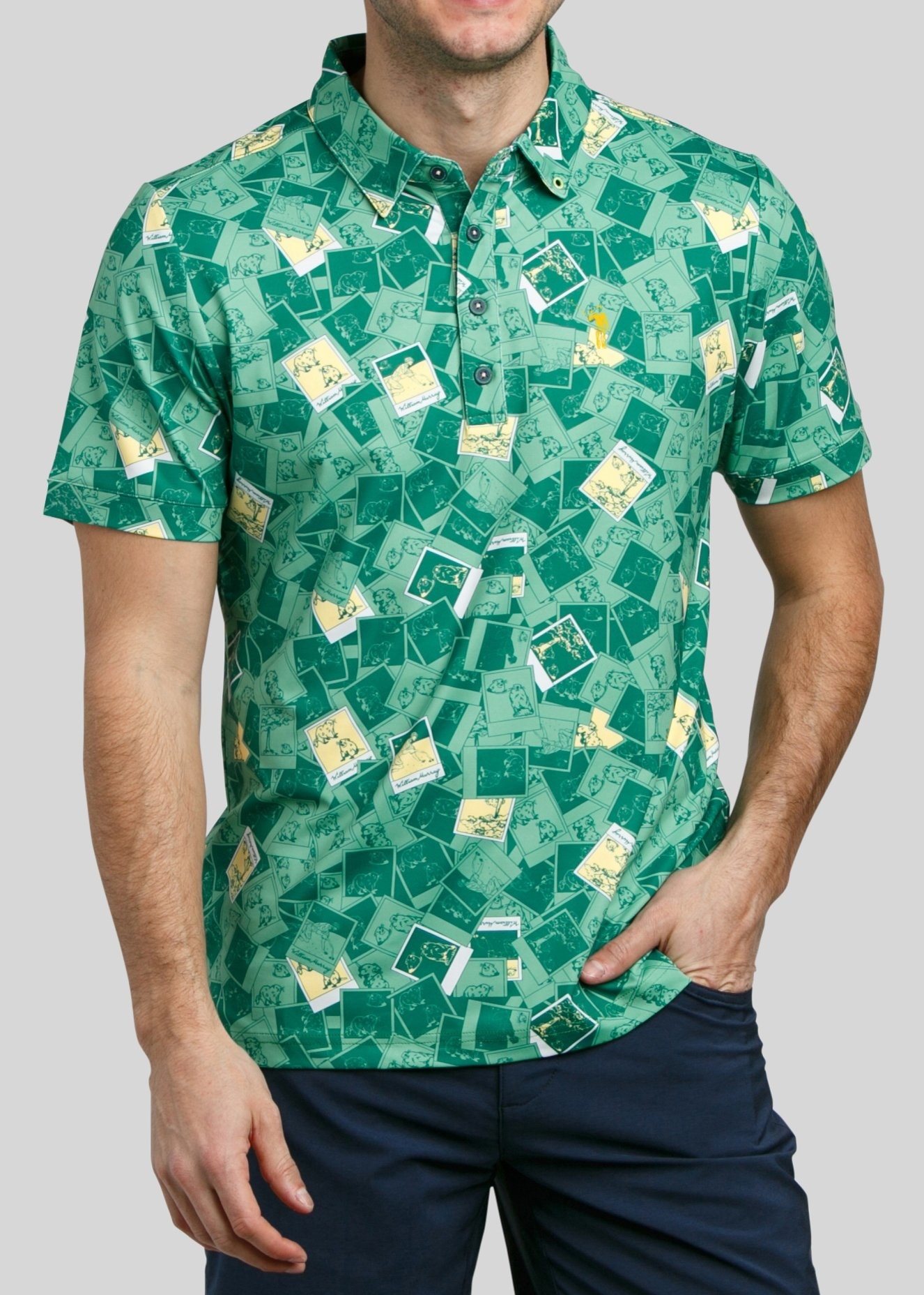 a model wearing a green polo with polaroids on it depicting the gopher from caddyshack