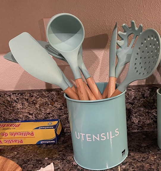 A reviewer&#x27;s kitchen utensil set on a kitchen counter